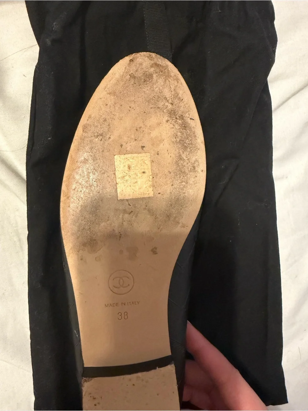 CHANEL Black Quilted Leather Cap-Toe Bow Ballet Flats